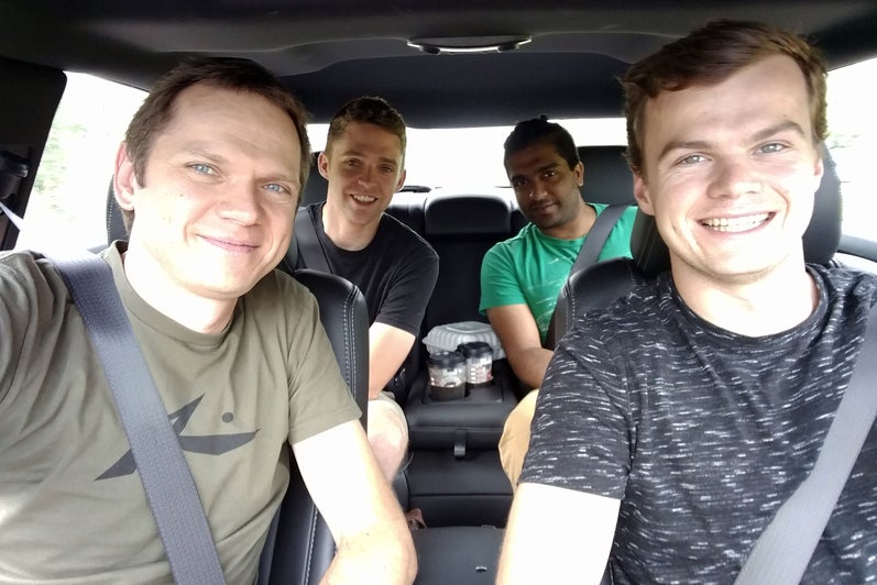 four members in a car