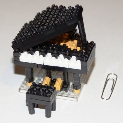 Small piano made from mini lego, with paperclip to compare size.