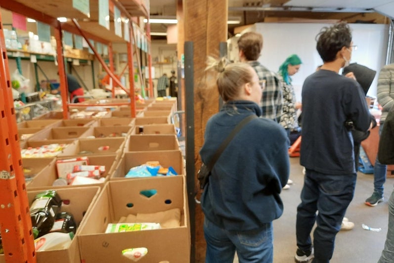The distribution centre containing boxes of sorted food at the Cambridge Food Bank