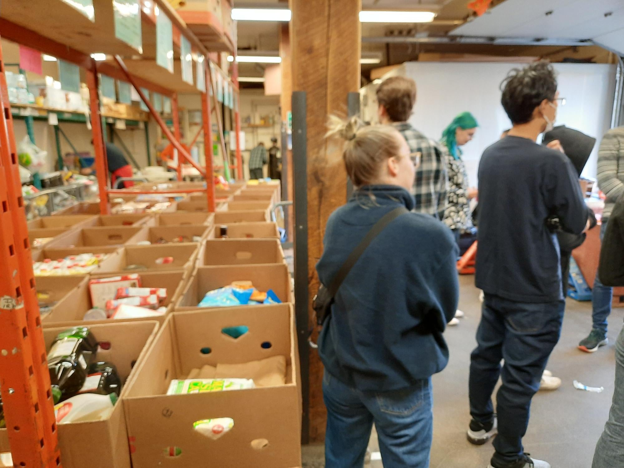The distribution centre containing boxes of sorted food at the Cambridge Food Bank