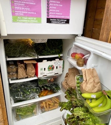 Various foods like bananas, vegetables and other food found inside the community fridge
