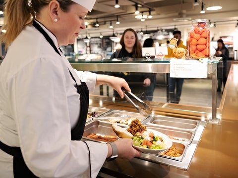 Chef Denise making a ramen bowl at South side marketplace