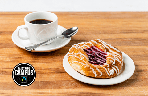 A cup of coffee and a danish