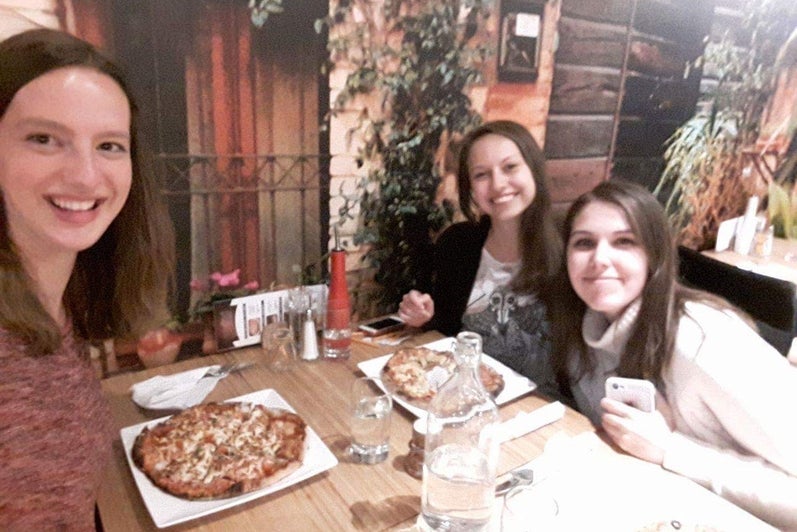 UWaterloo students enjoying dinner at a restaurant.