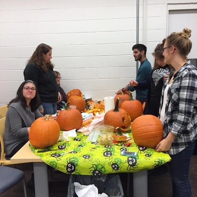 Students from the French department carving pumpkins