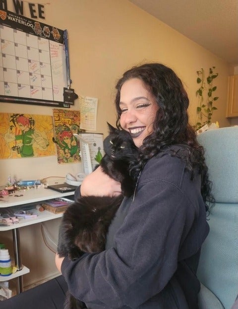 Ashley Montero with a cat