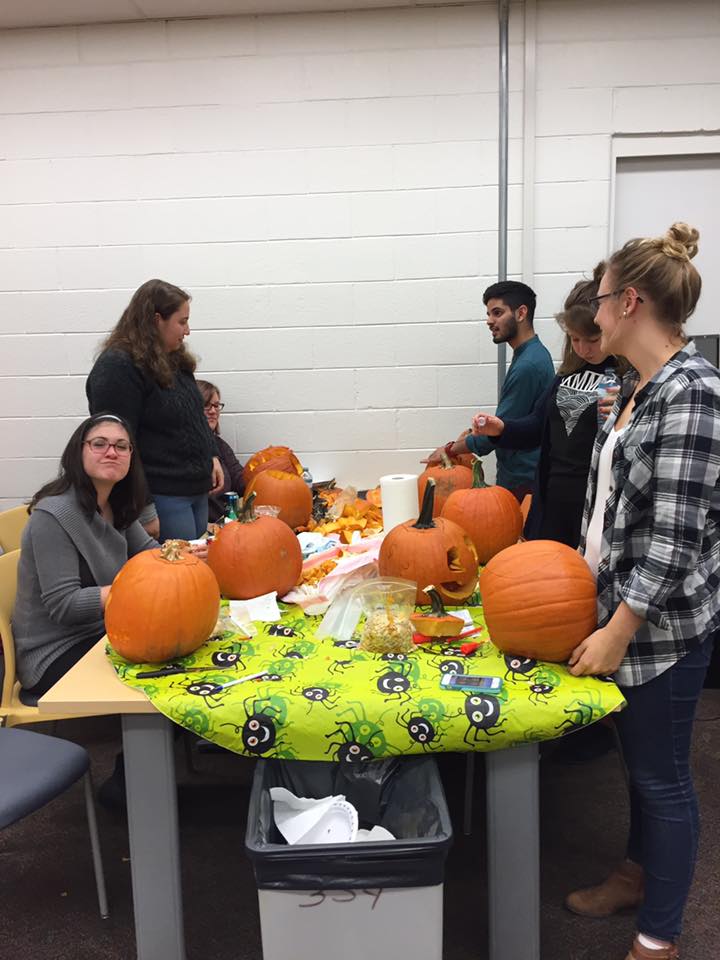 Students from the French department carving pumpkins