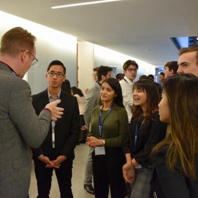 Fusion confrence 2019 attendees talking and eating