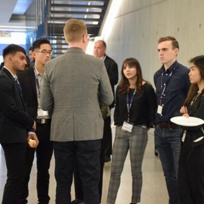 Fusion confrence 2019 attendees talking and eating