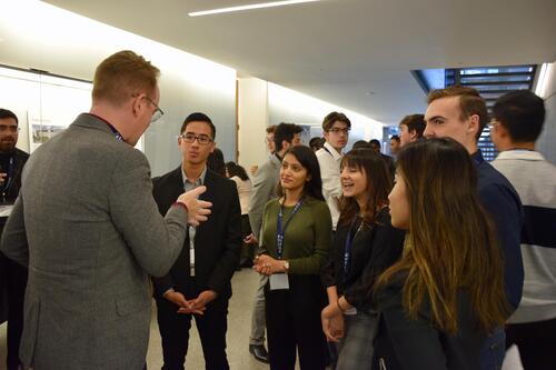 Fusion confrence 2019 attendees talking and eating