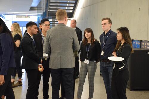 Fusion confrence 2019 attendees talking and eating