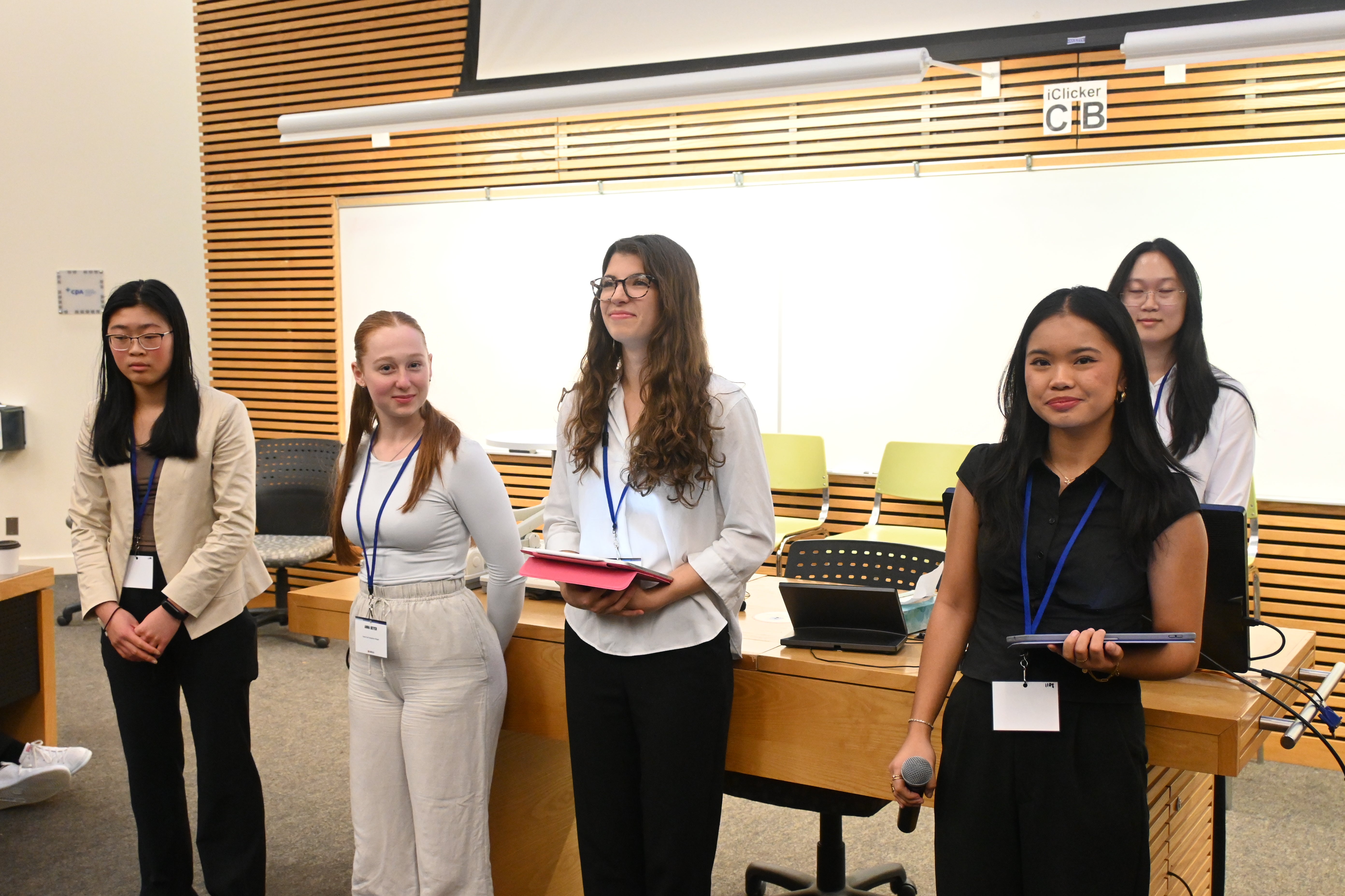 Group of female students presenting