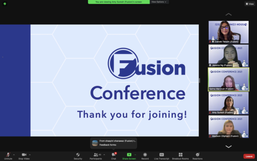 Screenshot of virtual conference with slideshow on left and participant's screens on the right