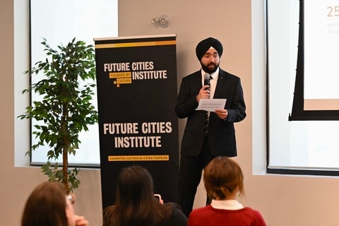 Sehaj Raj Singh speaking to a crowd 