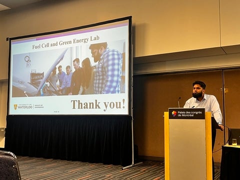 Dr. Shams speaking to a crowd