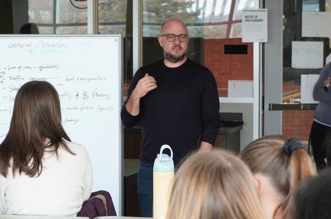 Scott speaking at the design charrette