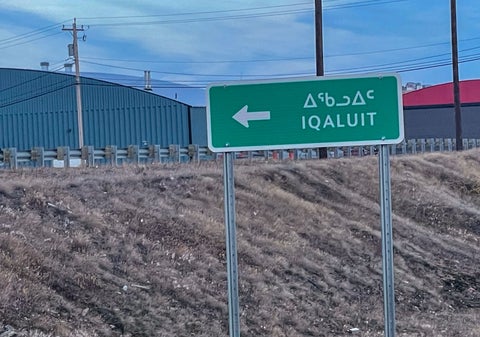 A street sign that says "Iqaluit"