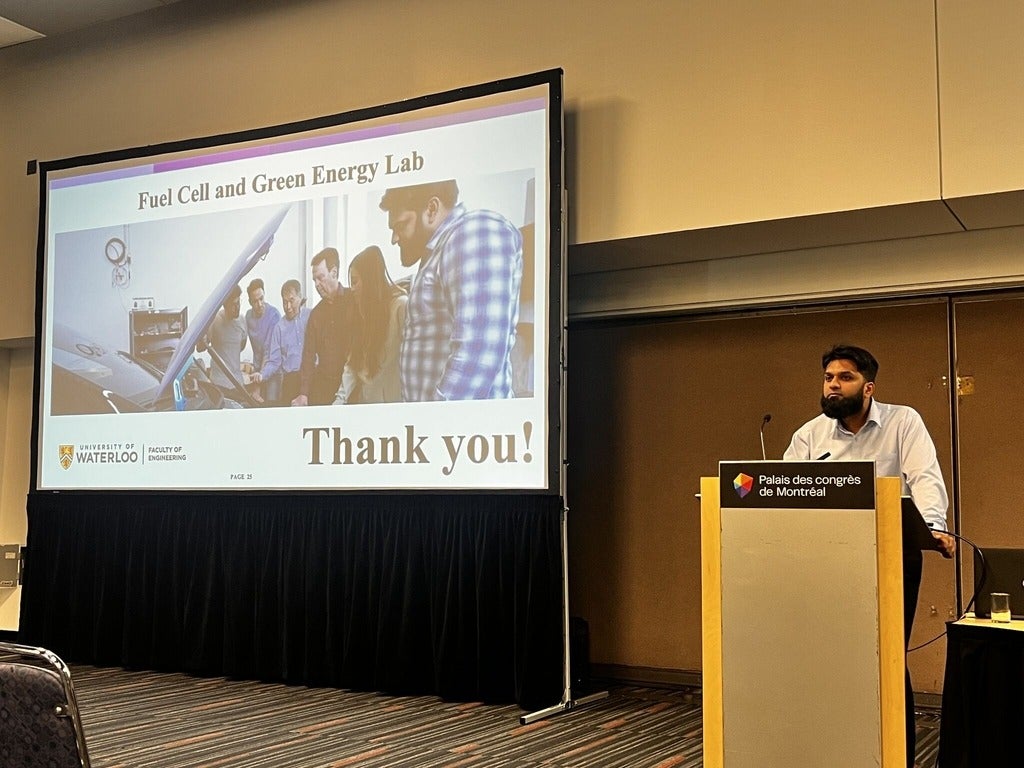 Dr. Shams speaking to a crowd