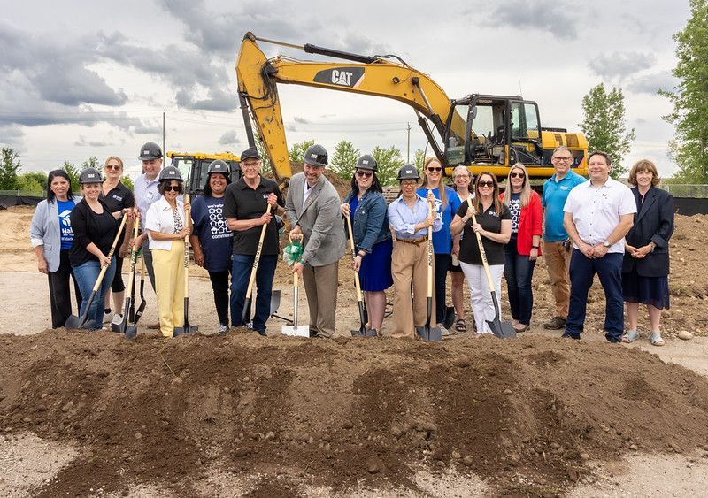Participants put shovels in ground for BUILD NOW's groundbreaking event