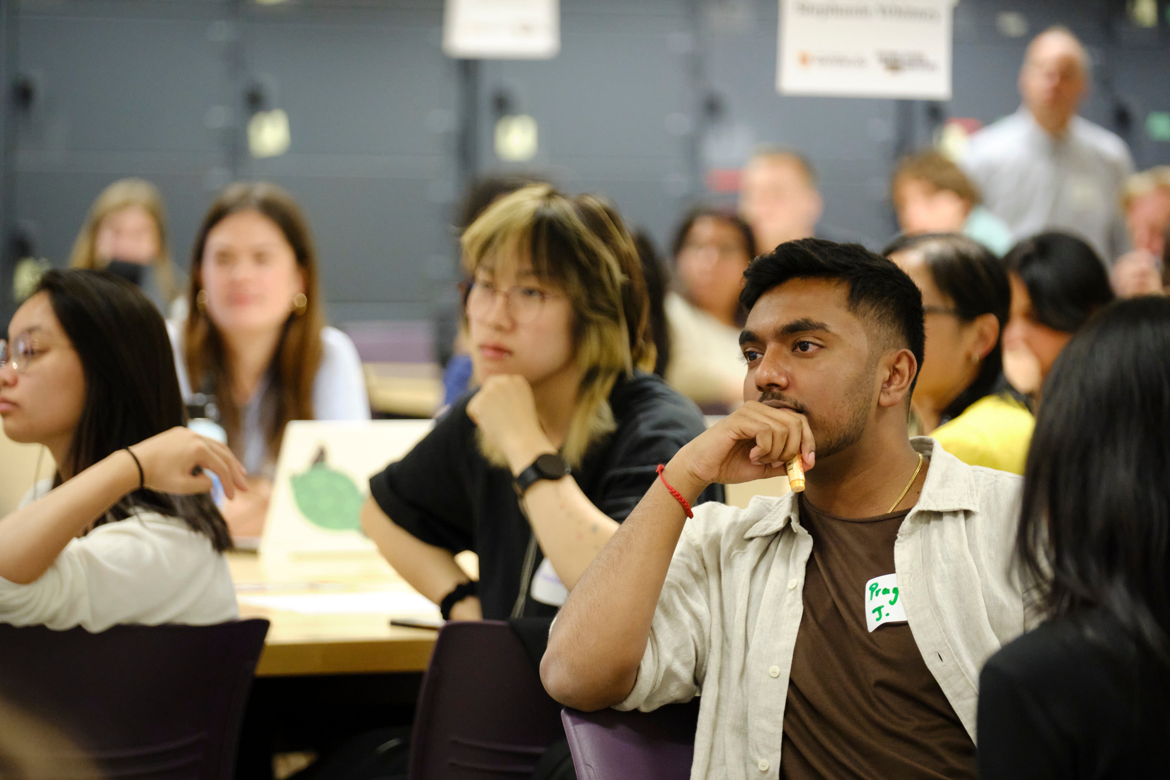 Students listening to the i-Capstone event speakers