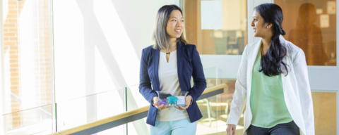 Health students walking together in the applied health sciences building.