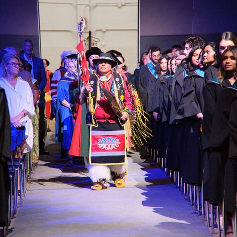 Elder Myeengun Henry leads the Indigenous Student Convocation Ceremony.