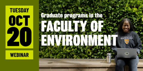 A student sits with a laptop in front of the living wall with the words Graduate programs in the Faculty of Environment across the banner
