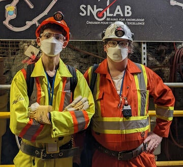 Science co-op student and supervisor standing in SNOLAB