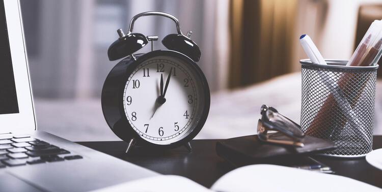 An alarm clock can be a useful tool for time management
