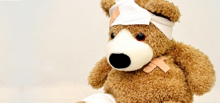 Teddy bear wearing bandages
