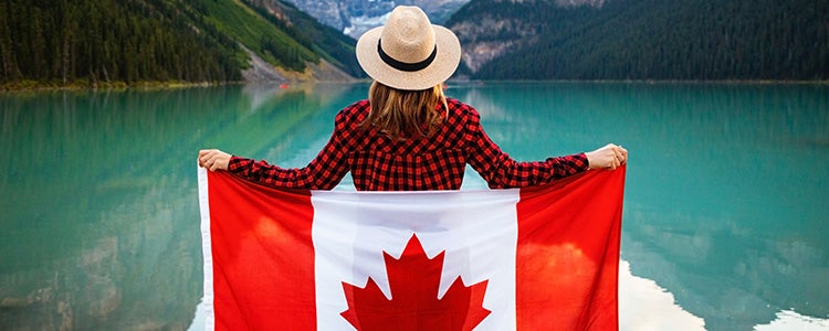 Person holding a Canadian flag