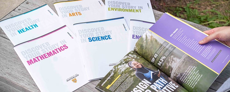 Waterloo's faculty brochures spread out on a table