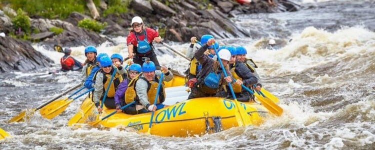 A group whitewater rafting.