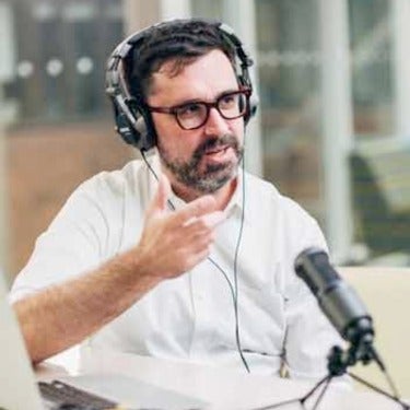 Rob Danish speaking during podcast