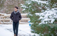 Honours Arts and Business student Aryan walks through the snow in Canada where he's earning his Bachelor of Arts degree.