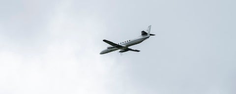 A plane flying in the sky.