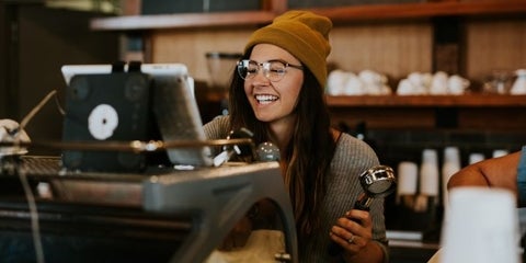 barista working at a trendy cafe