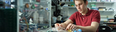 A student working on a project in a lab