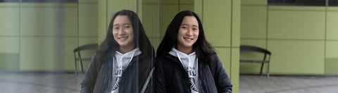 Michelle, an Environment student, standing outside the Environment 3 building