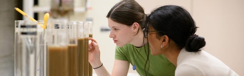 Geological engineering students analyzing sediment samples