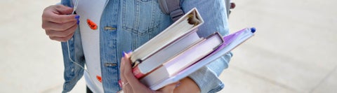 Student carrying books