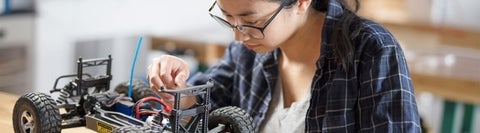 Student working on a robot.