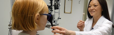 checking a patients eye