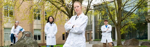 Group of Faculty of Science students wearing lab coats