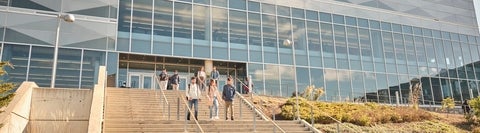 Students walking outside of E5