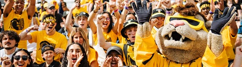 student body with warrior mascot