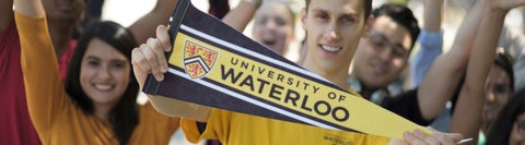 Student holding a University of Waterloo banner.