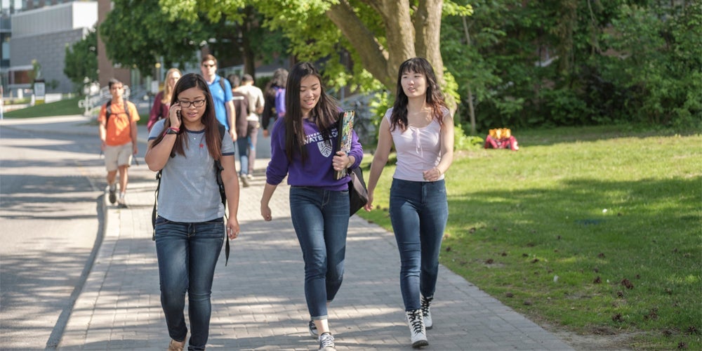 Students walking across campus.