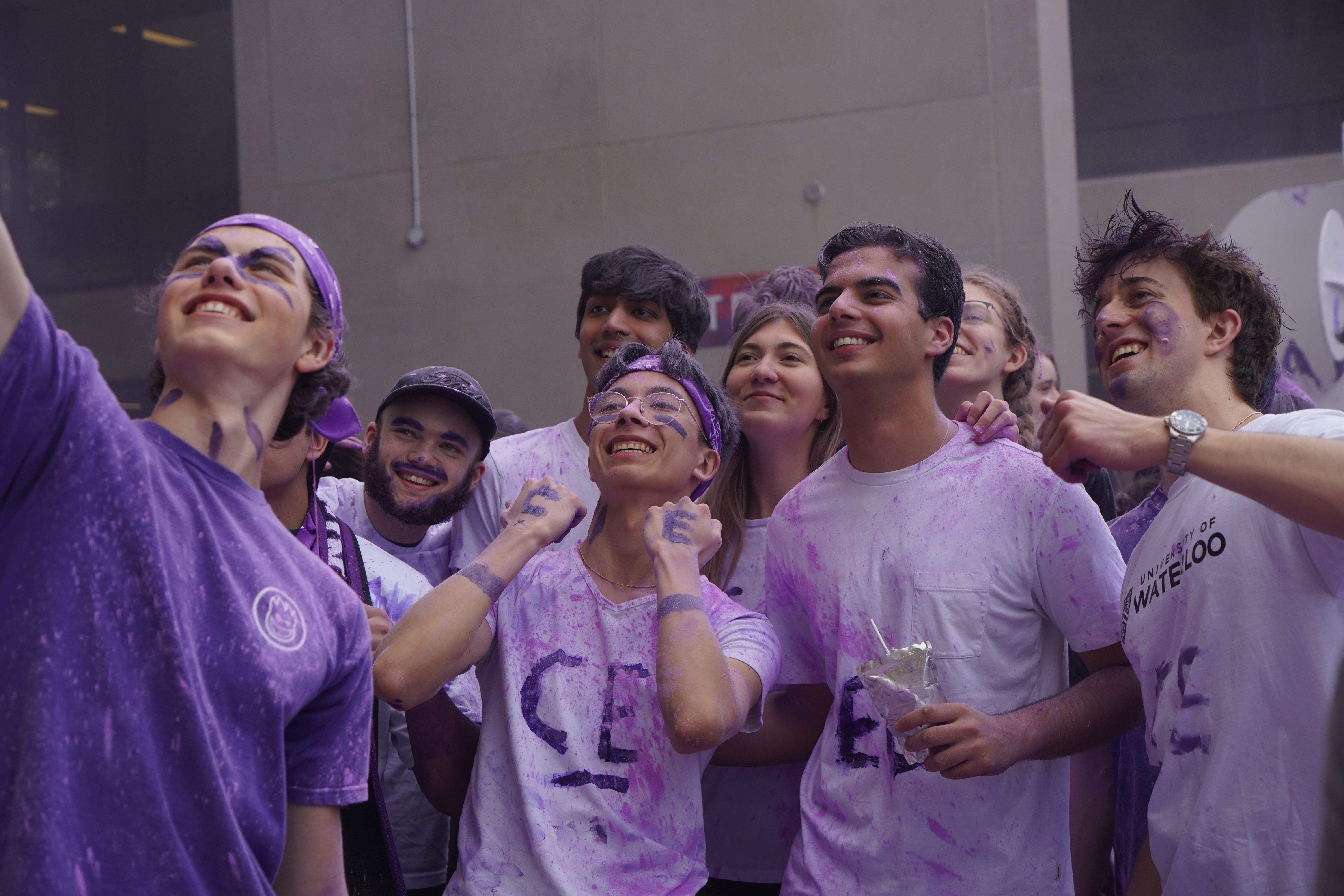 Engineering students painted purple at Orientation