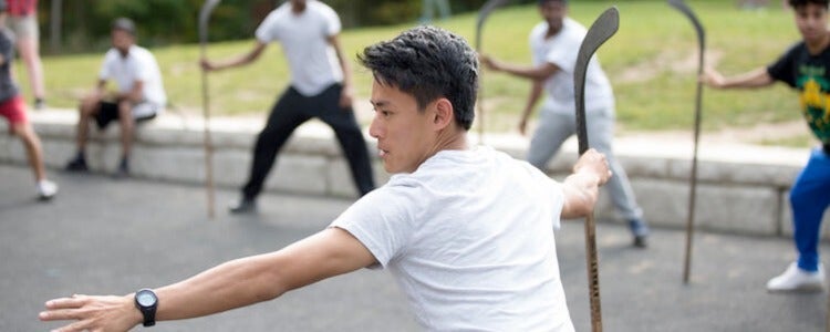 Jon participating in a group activity at the YMCA camp.